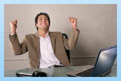 happy at the computer