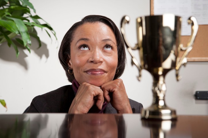 Business woman with award